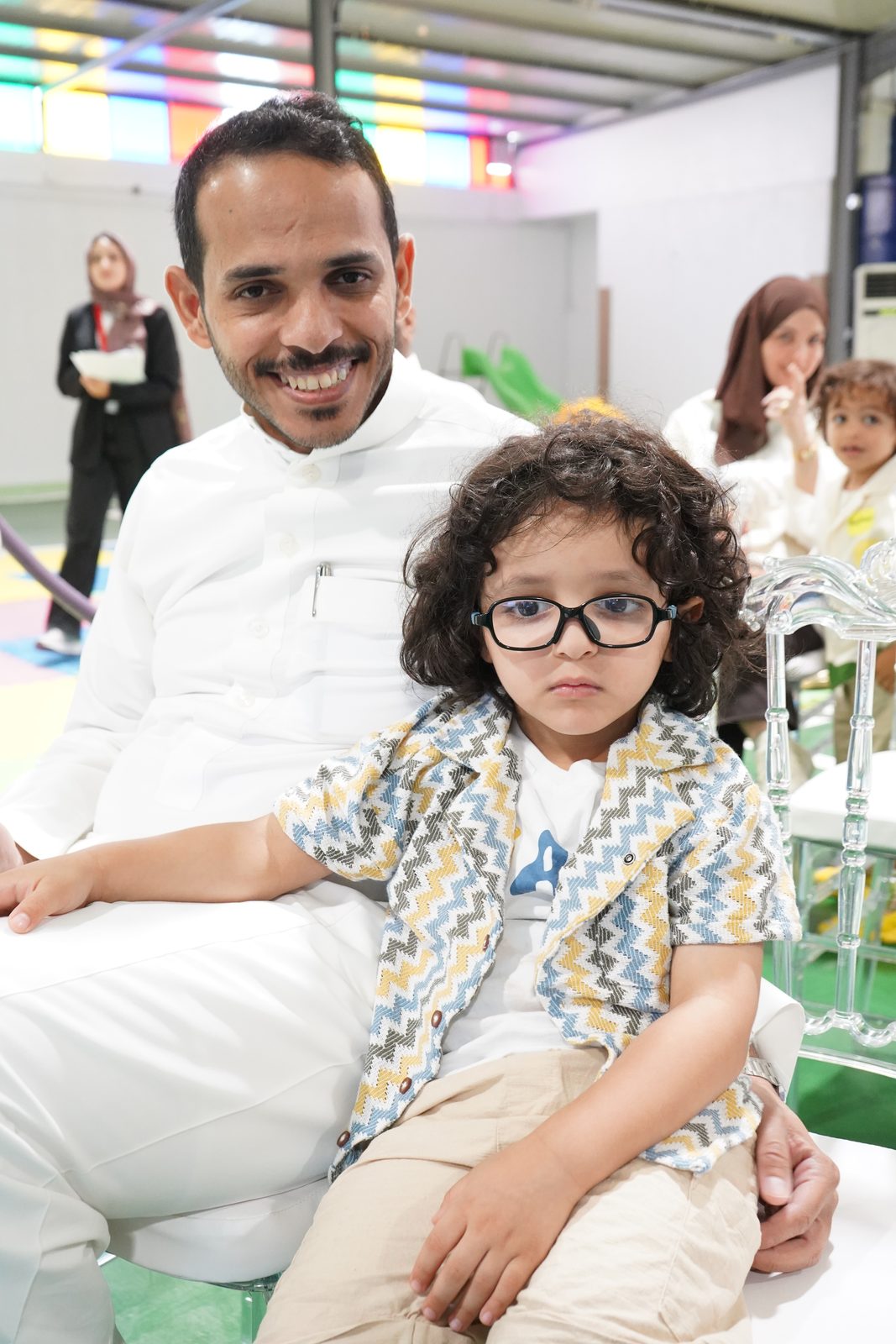 Father and child at the event